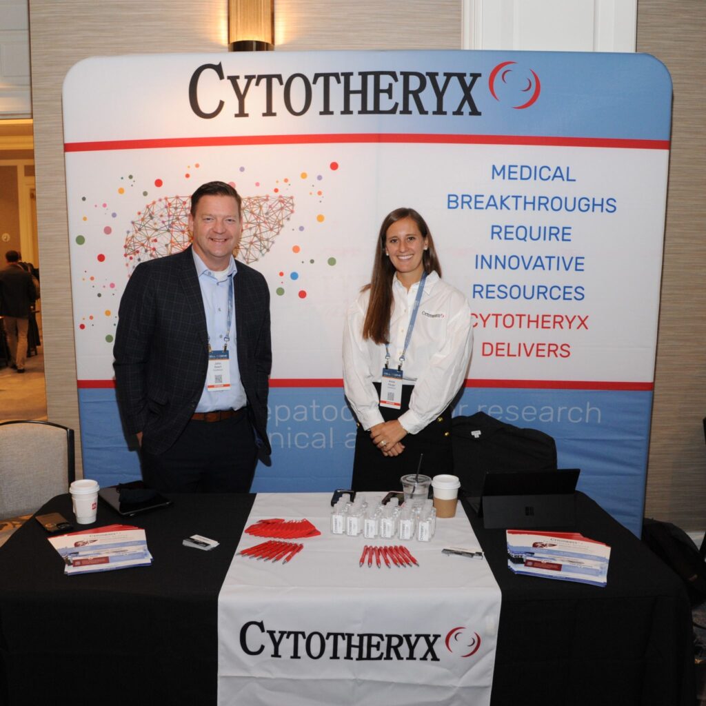 John and Anna from the Cytotheryx team at their booth for the Meeting on the Mesa conference.